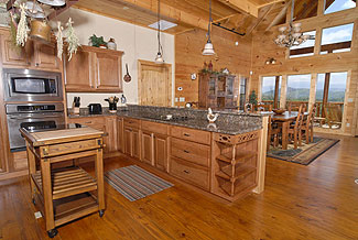 Deluxe cabin kitchen great for thanksgiving, holidays, or a night in at the cabin.Enjoy the view from the mountain view from the kitchen.